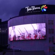 Twin Towns Curved LED Screen Building Facade Custom Digital Signage Solutions